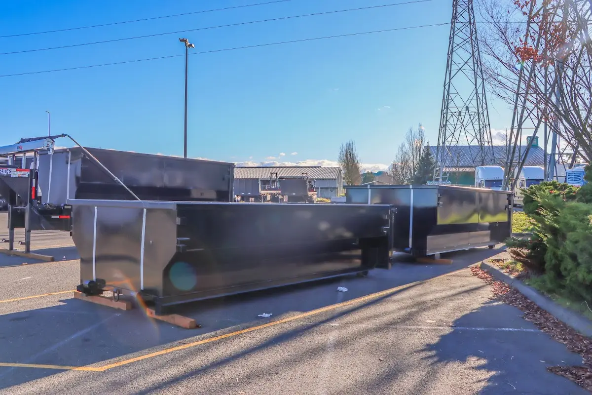 Roll-off dumpster ready for waste disposal at job site for Roll Off Dumpster Rental in Troy